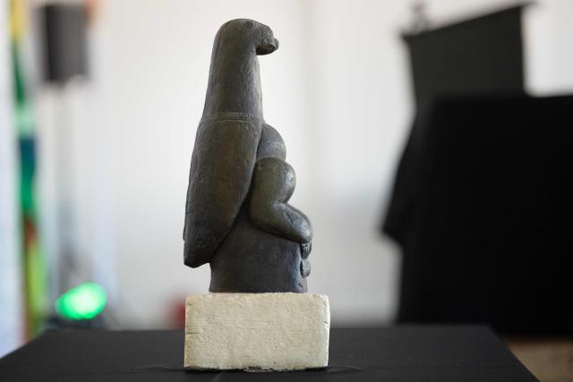 The Zimbabwean Bird, a soapstone sculpture of national significance, is visible at a repatriation handover event at the Iziko South African Museum, in Cape Town, on April 14, 2026. South Africa on Tuesday handed back to Zimbabwe ancestral human remains and a centuries-old stone carving of its sacred national emblem, the Zimbabwe bird, taken more than 100 years ago during the colonial era.
The restitution was part of a worldwide push for artefacts looted from African countries during the colonial era to be repatriated. (Photo by RODGER BOSCH / AFP)