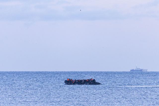 Migrants attempt to cross the English Channel in a smuggler's boat off the coast of Gravelines, northern France, on April 14, 2026. (Photo by Sameer Al-DOUMY / AFP)