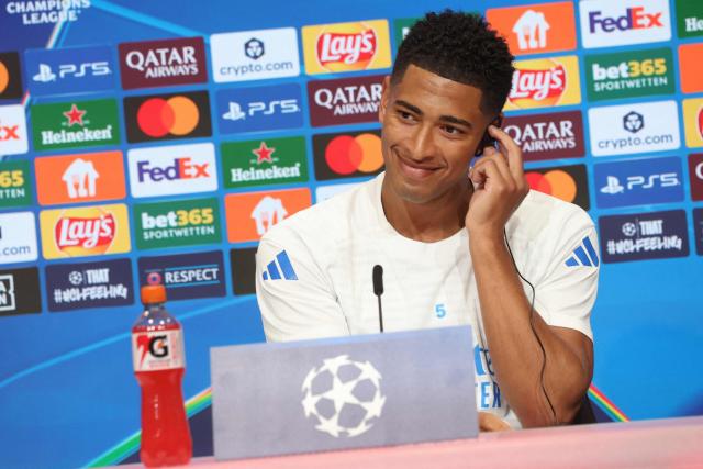 Real Madrid's English midfielder #05 Jude Bellingham addresses a press conference on April 14, 2026 in Munich, southern Germany, on the eve of the UEFA Champions League quarter-final second leg football match between FC Bayern Munich and Real Madrid. (Photo by Karl-Josef HILDENBRAND / AFP)