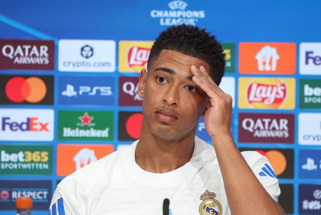 Real Madrid's English midfielder #05 Jude Bellingham addresses a press conference on April 14, 2026 in Munich, southern Germany, on the eve of the UEFA Champions League quarter-final second leg football match between FC Bayern Munich and Real Madrid. (Photo by Karl-Josef HILDENBRAND / AFP)