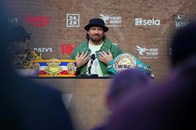 Ukraine's Oleksandr Usyk attends a press conference, in east London on April 14, 2026, ahead of his WBC World Heavyweight Championship 'Glory in Giza' boxing match against Netherlands' Rico Verhoeven, taking place on May 23, 2026, in Egypt. (Photo by CARLOS JASSO / AFP)