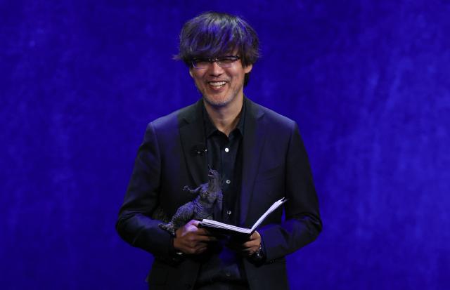 Japanese director Takashi Yamazaki presents the movie "Godzilla Minus Zero" during "The State of the Industry" and NEON presentation at CinemaCon at The Colosseum at Caesars Palace in Las Vegas, Nevada, on April 14, 2026. (Photo by VALERIE MACON / AFP)