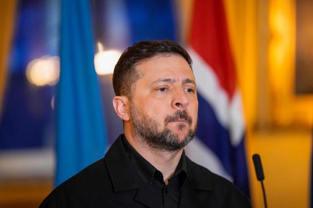 Ukrainian President Volodymyr Zelensky addresses a press conference with Norwegian Prime Minister Jonas Gahr Store (not in picture) in the government's representative building in Oslo, Norway on April 13, 2026. (Photo by Cornelius Poppe / NTB / AFP) / Norway OUT