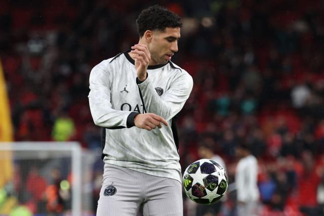 Paris Saint-Germain's Moroccan defender #02 Achraf Hakimi warms up ahead of the UEFA Champions League quarter final, second-leg football match between Liverpool and Paris Saint-Germain at Anfield in Liverpool, north west England on April 14, 2026. (Photo by FRANCK FIFE / AFP)