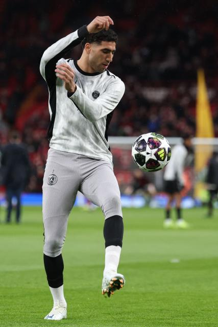 Paris Saint-Germain's Moroccan defender #02 Achraf Hakimi warms up ahead of the UEFA Champions League quarter final, second-leg football match between Liverpool and Paris Saint-Germain at Anfield in Liverpool, north west England on April 14, 2026. (Photo by FRANCK FIFE / AFP)
