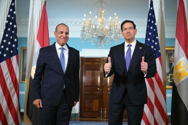 US Secretary of State Marco Rubio (R) and the Egyptian Foreign Minister Badr Abdelatty pose for photos during their meeting at the State Department in Washington, DC, on April 14, 2026. (Photo by Oliver Contreras / AFP)