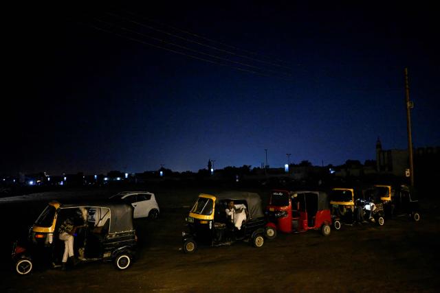 Sudanese tuktuk drivers wait for passengers in Port Sudan on April 14, 2026. (Photo by Khaled DESOUKI / AFP)