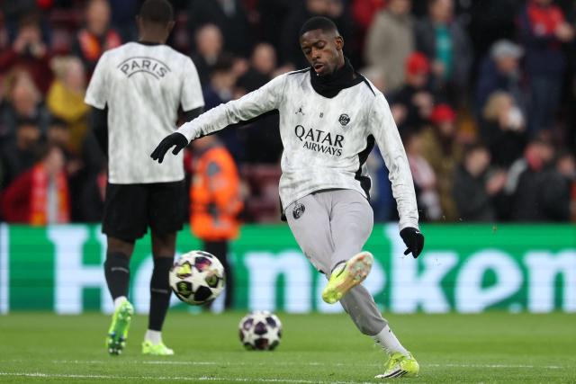 Paris Saint-Germain's French forward #10 Ousmane Dembele warms up ahead of the UEFA Champions League quarter final, second-leg football match between Liverpool and Paris Saint-Germain at Anfield in Liverpool, north west England on April 14, 2026. (Photo by FRANCK FIFE / AFP)