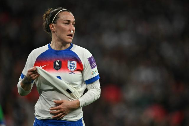 England's defender #02 Lucy Bronze plays on after having a bloody nose during the Women's FIFA world cup league A, group 3, qualifier football match between England and Spain at Wembley stadium, in London on April 14, 2026. (Photo by Ben STANSALL / AFP)