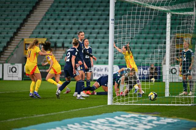 Belgium's Defender #02 Sari Kees (2L) celebrates scoring the team's first goal during the Women's FIFA world cup league B, group 4, qualifier football match between Scotland and Belgium at Easter Road, in Edinburgh, Scotland, on April 14, 2026. (Photo by ANDY BUCHANAN / AFP)