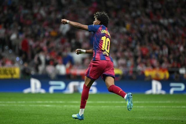 Barcelona's Spanish forward #10 Lamine Yamal celebrates scoring his team's first goal during the UEFA Champions League quarter final second leg football match between Club Atletico de Madrid and FC Barcelona at Metropolitano Stadium in Madrid on April 14, 2026. (Photo by Javier SORIANO / AFP)
