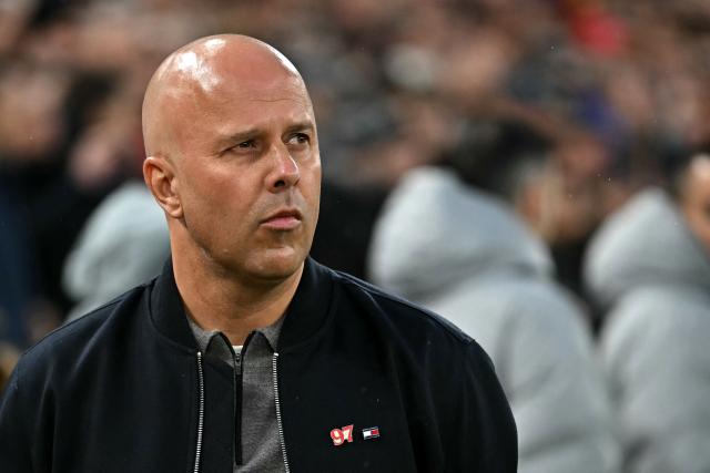 Liverpool's Dutch manager Arne Slot looks on before the UEFA Champions League quarter final, second-leg football match between Liverpool and Paris Saint-Germain at Anfield in Liverpool, north west England on April 14, 2026. (Photo by Paul ELLIS / AFP)