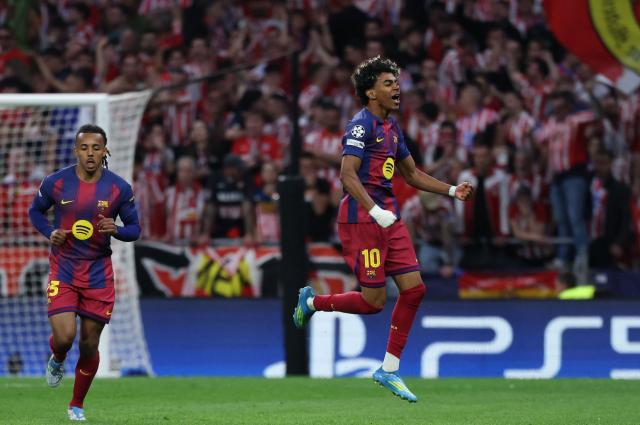 Barcelona's Spanish forward #10 Lamine Yamal celebrates scoring his team's first goal during the UEFA Champions League quarter final second leg football match between Club Atletico de Madrid and FC Barcelona at Metropolitano Stadium in Madrid on April 14, 2026. (Photo by Thomas COEX / AFP)