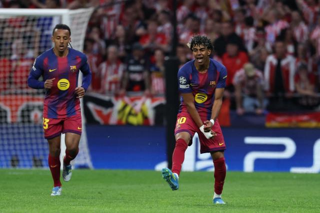 Barcelona's Spanish forward #10 Lamine Yamal celebrates scoring his team's first goal during the UEFA Champions League quarter final second leg football match between Club Atletico de Madrid and FC Barcelona at Metropolitano Stadium in Madrid on April 14, 2026. (Photo by Thomas COEX / AFP)