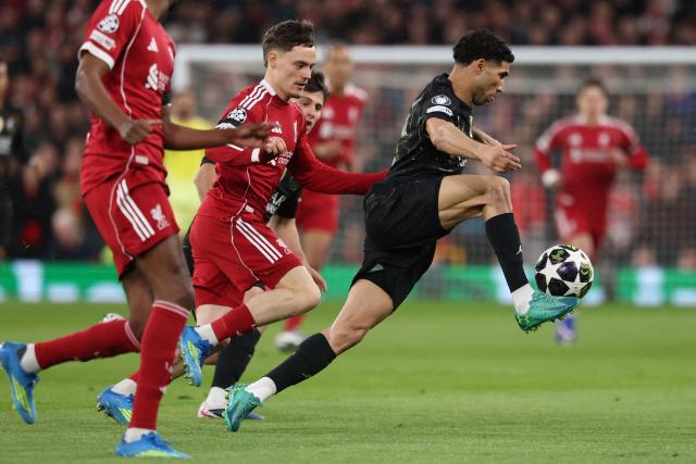 Paris Saint-Germain's Moroccan defender #02 Achraf Hakimi (R) controls the ball during the UEFA Champions League quarter final, second-leg football match between Liverpool and Paris Saint-Germain at Anfield in Liverpool, north west England on April 14, 2026. (Photo by FRANCK FIFE / AFP)