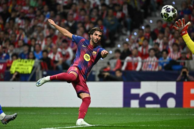 Barcelona's Spanish forward #07 Ferran Torres scores his team's second goal during the UEFA Champions League quarter final second leg football match between Club Atletico de Madrid and FC Barcelona at Metropolitano Stadium in Madrid on April 14, 2026. (Photo by Javier SORIANO / AFP)