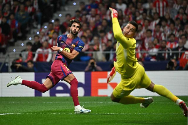 Barcelona's Spanish forward #07 Ferran Torres scores his team's second goal during the UEFA Champions League quarter final second leg football match between Club Atletico de Madrid and FC Barcelona at Metropolitano Stadium in Madrid on April 14, 2026. (Photo by Javier SORIANO / AFP)