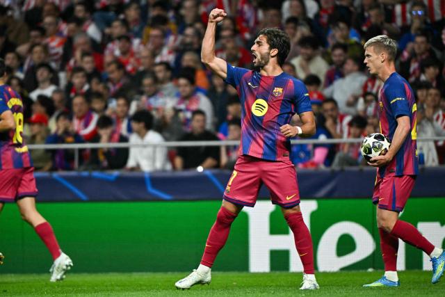 Barcelona's Spanish forward #07 Ferran Torres celebrates scoring his team's second goal during the UEFA Champions League quarter final second leg football match between Club Atletico de Madrid and FC Barcelona at Metropolitano Stadium in Madrid on April 14, 2026. (Photo by Javier SORIANO / AFP)