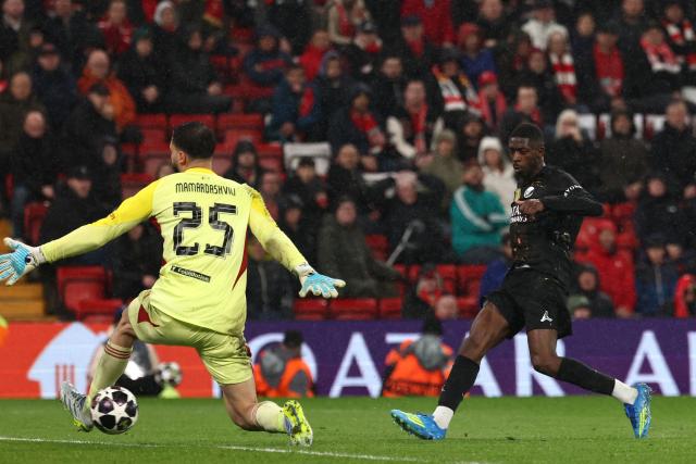Paris Saint-Germain's French forward #10 Ousmane Dembele scores the team's second goal during the UEFA Champions League quarter final, second-leg football match between Liverpool and Paris Saint-Germain at Anfield in Liverpool, north west England on April 14, 2026. (Photo by FRANCK FIFE / AFP)