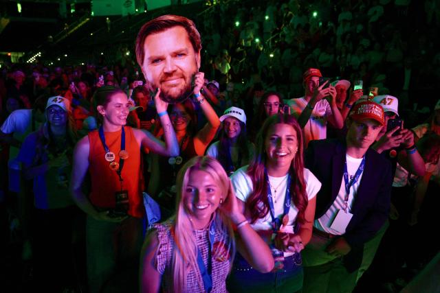 People cheer while waiting for the arival of US Vice President JD Vance to speak during a Turning Point USA event at the Akins Ford Arena at Classic Center in Athens, Georgia, on April 14, 2026. (Photo by Chip Somodevilla / POOL / AFP)