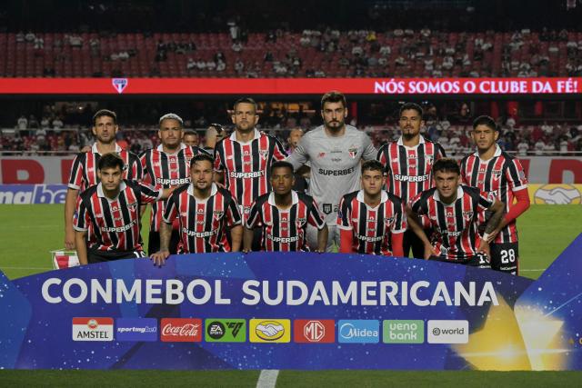 Sao Paulo players pose for a team photo ahead of the Copa Sudamericana group stage football match between Brazil's Sao Paulo and Chile's O'Higgins at the Morumbi stadium in Sao Paulo, Brazil, on April 14, 2026. (Photo by Nelson ALMEIDA / AFP)