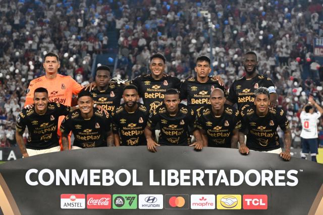 Players of Tolima pose for a picture ahead of the Copa Libertadores group stage football match between Uruguay's Nacional and Colombia's Deportes Tolima at the Gran Parque Central stadium in Montevideo on April 14, 2026. (Photo by EITAN ABRAMOVICH / AFP)