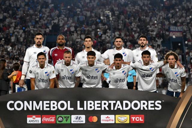 Players of Nacional pose for a picture ahead of the Copa Libertadores group stage football match between Uruguay's Nacional and Colombia's Deportes Tolima at the Gran Parque Central stadium in Montevideo on April 14, 2026. (Photo by EITAN ABRAMOVICH / AFP)