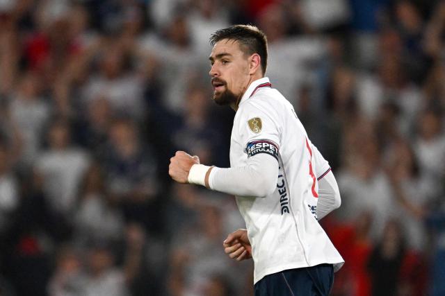 Nacional's defender #04 Sebastian Coates celebrates scoring his team's second goal during the Copa Libertadores group stage football match between Uruguay's Nacional and Colombia's Deportes Tolima at the Gran Parque Central stadium in Montevideo on April 14, 2026. (Photo by Eitan ABRAMOVICH / AFP)