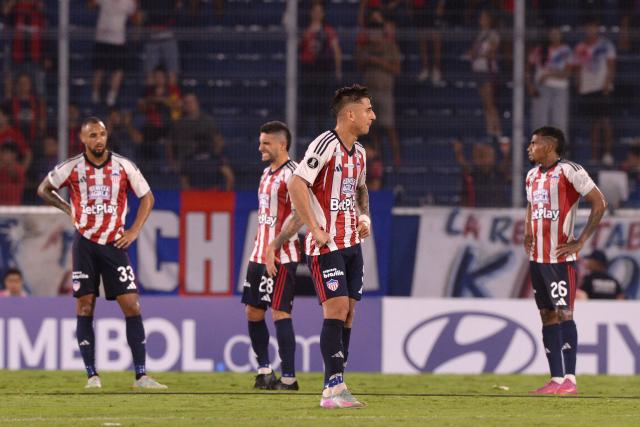 Junior's Paraguayan forward #09 Guillermo Paiva reacts after losing the Copa Libertadores group stage football match between Paraguay's Cerro Porteno and Colombia's Junior at the La Nueva Olla stadium in Asuncion on April 14, 2026. (Photo by Daniel Duarte / AFP)