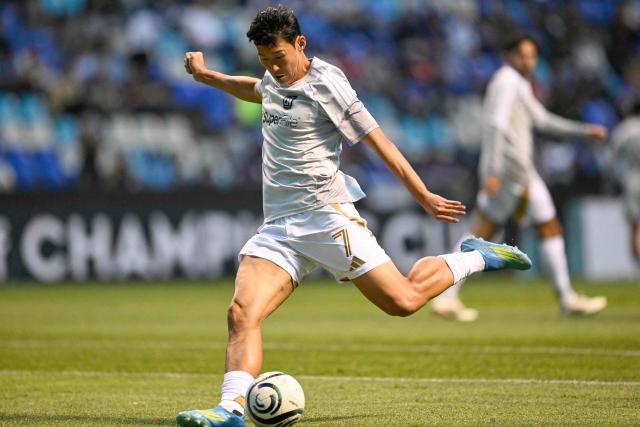Los Angeles FC's South Korean forward #07 Son Heung-Min warms up ahead of the CONCACAF Champions Cup quarterfinal football match between Mexico's Cruz Azul and US' Los AngelesFC (LAFC) at Cuauhtemoc stadium in Puebla, Mexico on April 14, 2026. (Photo by YURI CORTEZ / AFP)