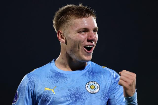 Montevideo City Torque's forward #18 Ramiro Lecchini celebrates his team's second goal during the Copa Sudamericana group stage football match between Chile's Palestino and Uruguay's Montevideo City Torque at Municipal de la Cisterna stadium in Santiago on April 14, 2026. (Photo by Javier TORRES / AFP)