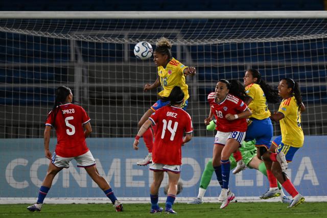 Colombia's defender #16 Jorelyn Carabali heads the ball during the CONMEBOL Nations League Women football match between Colombia and Chile, at the Olimpico Pascual Guerrero stadium in Cali, Valle del Cauca, Colombia, on April 14, 2026. (Photo by JOAQUIN SARMIENTO / AFP)