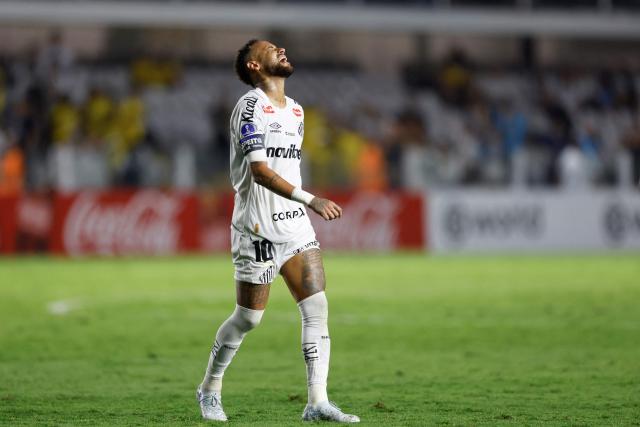 Santos' forward #10 Neymar gestures during the Copa Sudamericana group stage football match between Brazil's Santos and Paraguay's Deportivo Recoleta at the Urbano Caldeira stadium in Santos, state of Sao Paulo, Brazil, on April 14, 2026. (Photo by Miguel SCHINCARIOL / AFP)