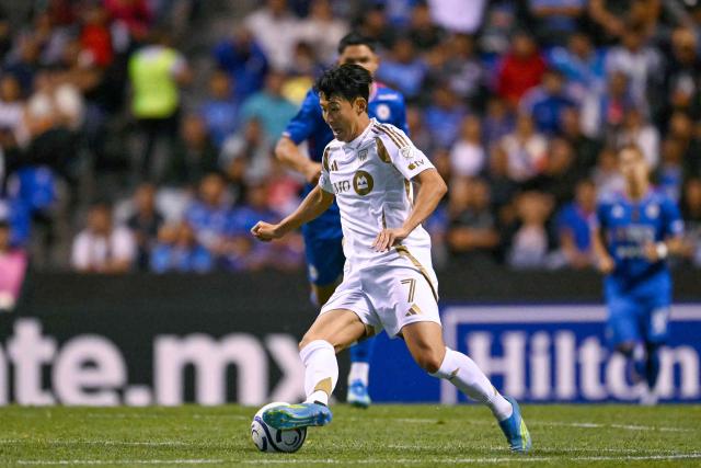 Los Angeles FC's South Korean forward #07 Son Heung-Min controls the ball during the CONCACAF Champions Cup quarterfinal football match between Mexico's Cruz Azul and US' Los AngelesFC (LAFC) at Cuauhtemoc stadium in Puebla, Mexico on April 14, 2026. (Photo by YURI CORTEZ / AFP)