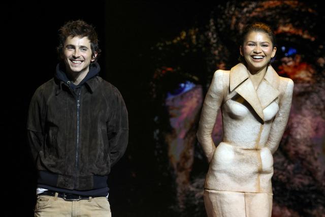 French-US actor Timothee Chalamet and US actress Zendaya promote the upcoming film “Dune: Part Three” during the Warner Bros presentation at CinemaCon at The Colosseum at Caesars Palace on April 14, 2026 in Las Vegas, Nevada. (Photo by VALERIE MACON / AFP)