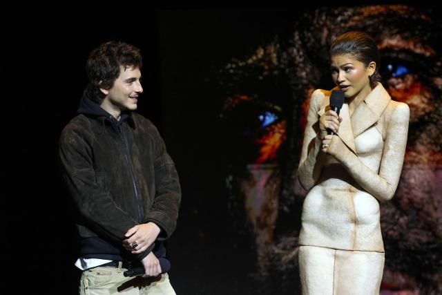 French-US actor Timothee Chalamet and US actress Zendaya promote the upcoming film “Dune: Part Three” during the Warner Bros presentation at CinemaCon at The Colosseum at Caesars Palace on April 14, 2026 in Las Vegas, Nevada. (Photo by VALERIE MACON / AFP)