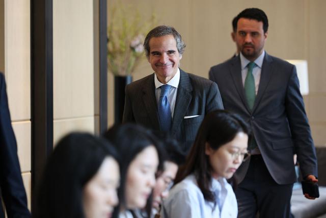 Director General of the International Atomic Energy Agency (IAEA) Rafael Grossi arrives at a press conference in Seoul on April 15, 2026. (Photo by KIM HONG-JI / AFP)