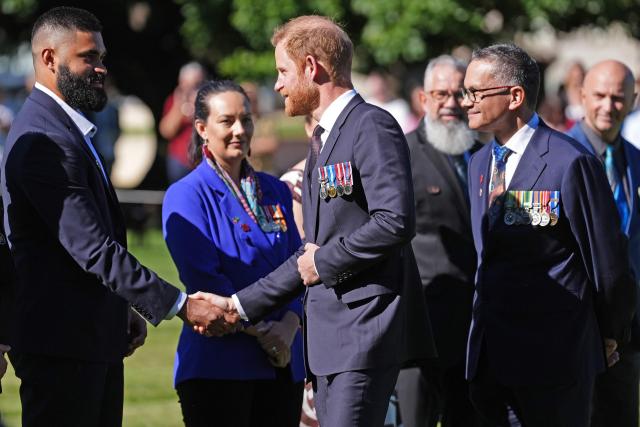 Britain's Prince Harry, the Duke of Sussex (C), greets Indigenous veterans at the For Our Country memorial during a visit to the Australian War Memorial in Canberra on April 15, 2026. (Photo by Jonathan Brady / AFP)