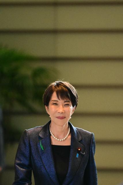 Japan's Prime Minister Sanae Takaichi arrives to a press conference at the Prime Minister's Office in Tokyo on April 15 2026. (Photo by Philip FONG / POOL / AFP)