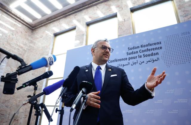 the US' Department of State's senior advisor to the president for Arab and African Affairs Massad Fares Boulos gives a statement as he arrives to attend the third international conference on Sudan, at the Foreign Office in Berlin on April 15, 2026. Now entering its fourth year, the war in Sudan between the army and the paramilitary Rapid Support Forces (RSF) has killed tens of thousands of people, displaced more than 11 million, and thrust several areas into hunger and famine. Donors are due to gather in Berlin on April 15 for an international conference on the conflict, aimed at reviving faltering peace talks and mobilising aid. The meeting brings together governments, aid agencies and civil society groups, but excludes both the Sudanese army and the paramilitary Rapid Support Forces. (Photo by Odd ANDERSEN / AFP)