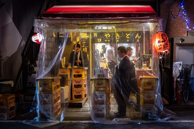 Diners visit a "yakiton" grilled pork restaurant in Tokyo's Asakusabashi district on April 15, 2026. (Photo by Philip FONG / AFP)