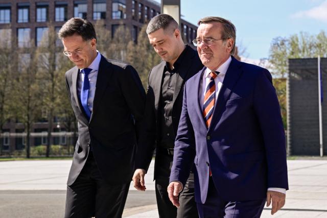 (From L) NATO Secretary General Mark Rutte, Ukraine's Defence Minister Mykhailo Fedorov and German Defence Minister Boris Pistorius leave after a family picture prior to a Ministerial Meeting of the Ukraine Defence Contact Group (UDCG) at the German Defence Ministry in Berlin on April 15, 2026. (Photo by Tobias SCHWARZ / AFP)