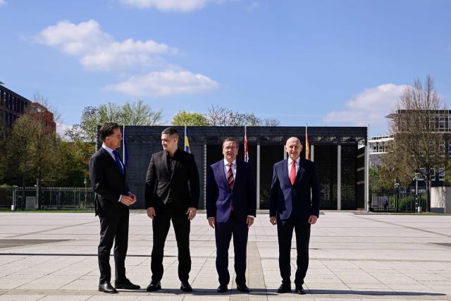 (From L) NATO Secretary General Mark Rutte, Ukraine's Defence Minister Mykhailo Fedorov, German Defence Minister Boris Pistorius and Britain's Defence Secretary John Healey pose prior to a Ministerial Meeting of the Ukraine Defence Contact Group (UDCG) at the German Defence Ministry in Berlin on April 15, 2026. (Photo by Tobias SCHWARZ / AFP)