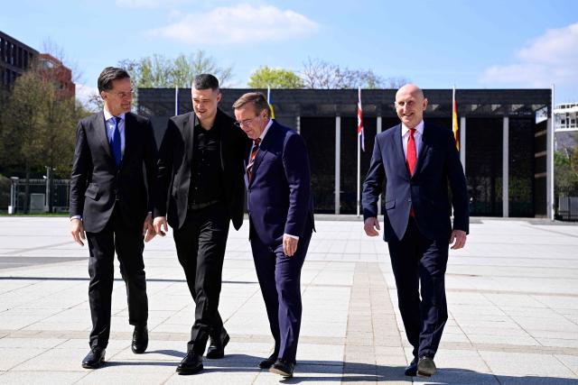 (From L) NATO Secretary General Mark Rutte, Ukraine's Defence Minister Mykhailo Fedorov, German Defence Minister Boris Pistorius and Britain's Defence Secretary John Healey leave after a family picture prior to a Ministerial Meeting of the Ukraine Defence Contact Group (UDCG) at the German Defence Ministry in Berlin on April 15, 2026. (Photo by Tobias SCHWARZ / AFP)