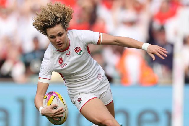 (FILES) England's full back Ellie Kildunne scores a try during the Women’s Rugby World Cup final between Canada and England at the Allianz Stadium, Twickenham, south-west London on September 27, 2025. England women's rugby star Ellie Kildunne has revealed on April 15, 2026 she struggled with an eating disorder and other health issues during the coronavirus lockdown. (Photo by Adrian Dennis / AFP)