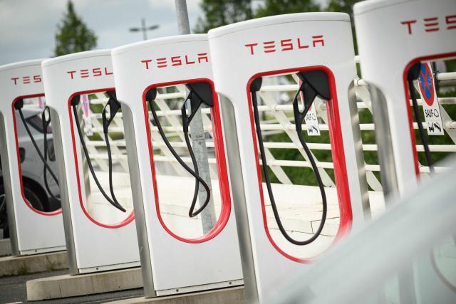 This photograph shows charging points at a Tesla electric charging station in Saint-Herblain, western France, on April 15, 2026, as US-Israel war on Iran, launched on February 28, has roiled global energy and equities markets, sending oil prices skyrocketing after Tehran virtually closed the key Strait of Hormuz. (Photo by Loic VENANCE / AFP)