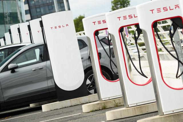 This photograph shows a Tesla electric charging station in Saint-Herblain, western France, on April 15, 2026, as US-Israel war on Iran, launched on February 28, has roiled global energy and equities markets, sending oil prices skyrocketing after Tehran virtually closed the key Strait of Hormuz. (Photo by Loic VENANCE / AFP)