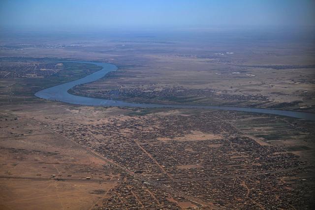 This aerial photo shows the Nile River in the capital Khartoum on April 15, 2026, on the third anniversary of the start of the war between the army and its paramilitary foes. On the third anniversary of the start of the grinding conflict on April 15, donors will gather in Berlin for an international conference aimed at reviving faltering peace talks and mobilising aid for one of the world's worst humanitarian crises. (Photo by Khaled DESOUKI / AFP)