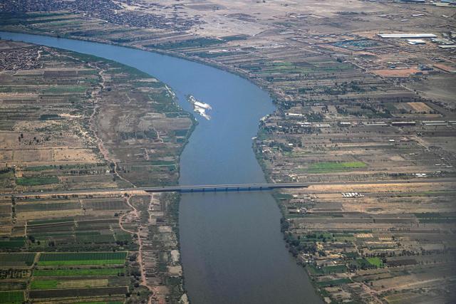 This aerial photo shows the Nile River in the capital Khartoum on April 15, 2026, on the third anniversary of the start of the war between the army and its paramilitary foes. On the third anniversary of the start of the grinding conflict on April 15, donors will gather in Berlin for an international conference aimed at reviving faltering peace talks and mobilising aid for one of the world's worst humanitarian crises. (Photo by Khaled DESOUKI / AFP)