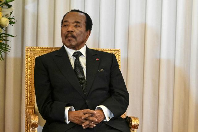 Cameroon's President Paul Biya looks on as Pope Leo XIV (unseen) delivers a speech at The Presidential Palace in Yaounde, on the third day of an 11-day apostolic journey to Africa, on April 15, 2026. (Photo by Alberto PIZZOLI / AFP)